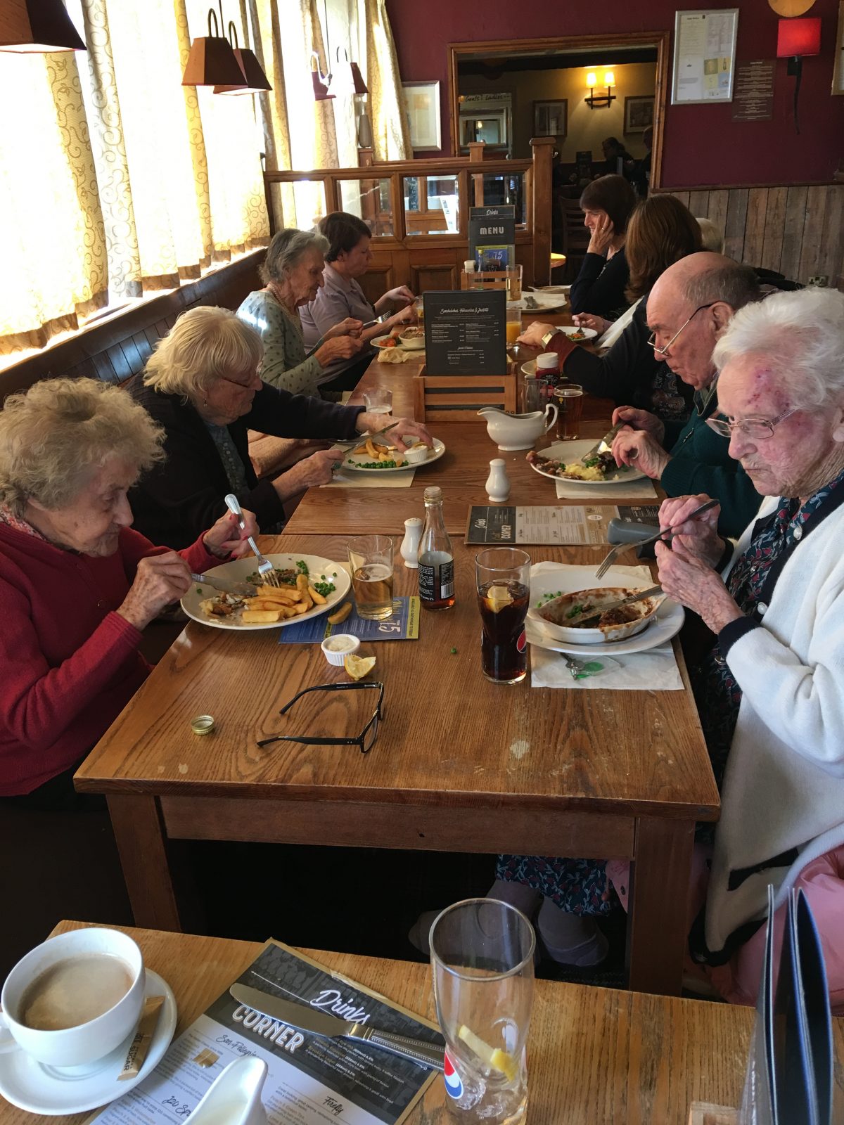 A FEW RESIDENTS ENJOYING LUNCH AND A TIPPLE